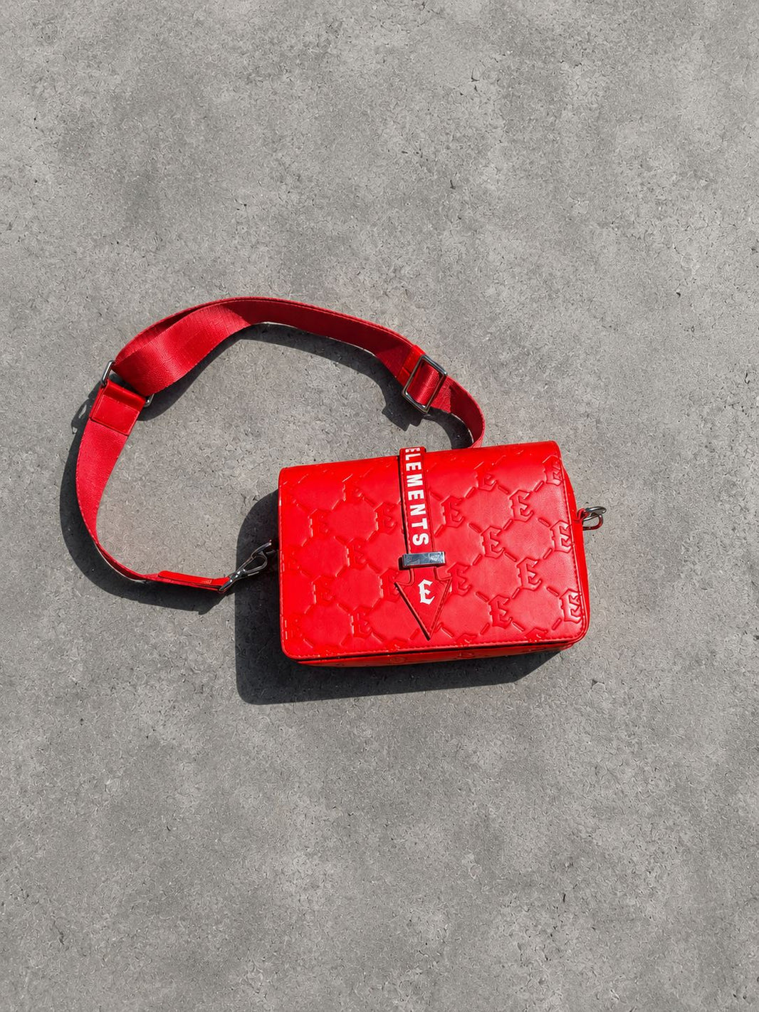 saint elements - red bag