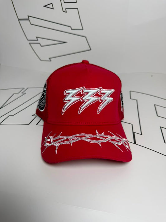 Red cap with white logo on a white background